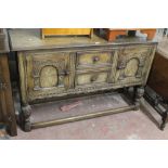 AN ANTIQUE OAK SIDEBOARD