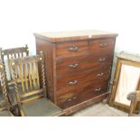 A TWO OVER THREE MAHOGANY CHEST OF DRAWERS WITH RIBBON HANDLES