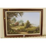 A FRAMED OIL ON CANVAS OF A COUNTRY COTTAGE BY THE SEA