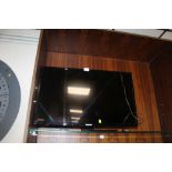 A PANASONIC FLATSCREEN TV