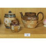 A ROYAL DOULTON LAMBETH LIDDED TEAPOT, TOGETHER WITH A LIDDED JAR AND A SMALL JUG A/F