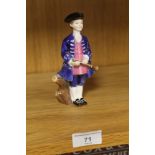 A ROYAL DOULTON FIGURE 'THE BOY FROM WILLIAMSBURG' HN.2183