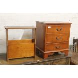 A YEWWOOD THREE DRAWER BEDSIDE CABINET TOGETHER WITH A SIMILAR LEATHER TOPPED MAGAZINE RACK