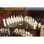 TWO MODERN MOULDED 'ALICE IN WONDERLAND' CHESS SETS