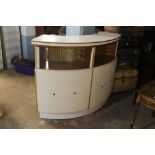 A RETRO CURVED BAR / COCKTAIL CABINET