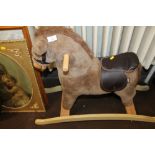 A MOMAS AND PAPAS CHILDS ROCKING HORSE