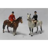 A BESWICK HUNTSMAN AND HUNTS WOMEN ON HORSEBACK