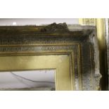 A LARGE GILT PICTURE FRAME