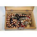 A BOX OF COSTUME JEWELLERY ETC.