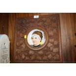 A CARVED WOOD FRAMED CONTINENTAL STYLE PORCELAIN PLAQUE FEATURING A PORTRAIT OF A LADY
