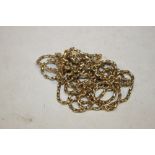 A VICTORIAN TYPE ROLLED GOLD MUFF CHAIN