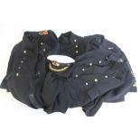 A GROUP OF FOUR VINTAGE NAVAL JACKETS, a pair of trousers and an officer's cap