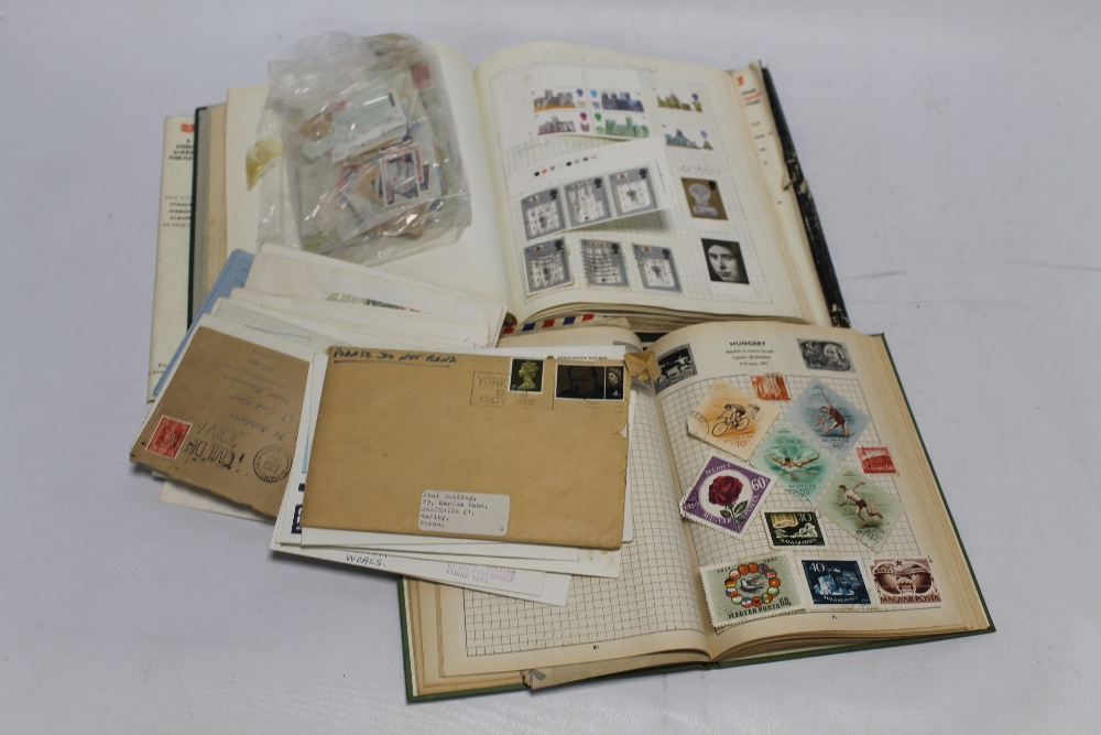 A COLLECTION OF WORLDWIDE STAMPS, BOTH LOOSE AND IN ALBUMS, together with various First Day Covers