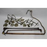 A QUANTITY OF HORSE RIDING CROPS, BITS, HORSE BRASSES ETC.