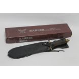 A RANGER BOWIE / HUNTING KNIFE, in leather scabbard, with box