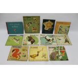 PÈRE CASTOR'S WILD ANIMAL BOOKS' SET OF EIGHT by Lida, lithographs by Rojan, translated by Rose Fyl