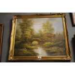 A GILT FRAMED OIL ON CANVAS DEPICTING A BRIDGE IN A COUNTRY SETTING SIGNED S. CATHY