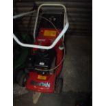 A MOUNTFIELD PETROL LAWNMOWER WITH GRASS BOX