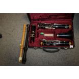 A CASED BLESSING CLARINET TOGETHER WITH TWO RECORDERS (3)