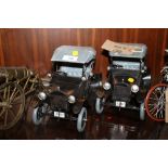A PAIR OF MODERN TIN PLATE MODEL T FORD CARS