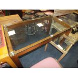 A LARGE GLASS TOPPED DESK W 140 cm