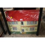 A WOODEN DOLLS HOUSE AND FURNITURE