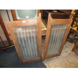 A PAIR OF VINTAGE FRAMED GLASS PANELS H 107 CM