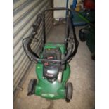 A TECUMSEH PETROL LAWN MOWER