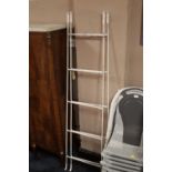 A PAIR OF WHITE METAL LADDERS