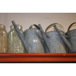 TWO GALVANIZED WATERING CANS