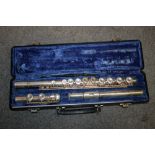 A CASED BUESCHER FLUTE