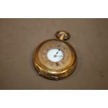 A ROLLED GOLD HALF HUNTER POCKET WATCH