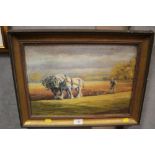 A GILT FRAMED OIL ON CANVAS DEPICTING A HORSE AND PLOUGH SIGNED R M SHAW