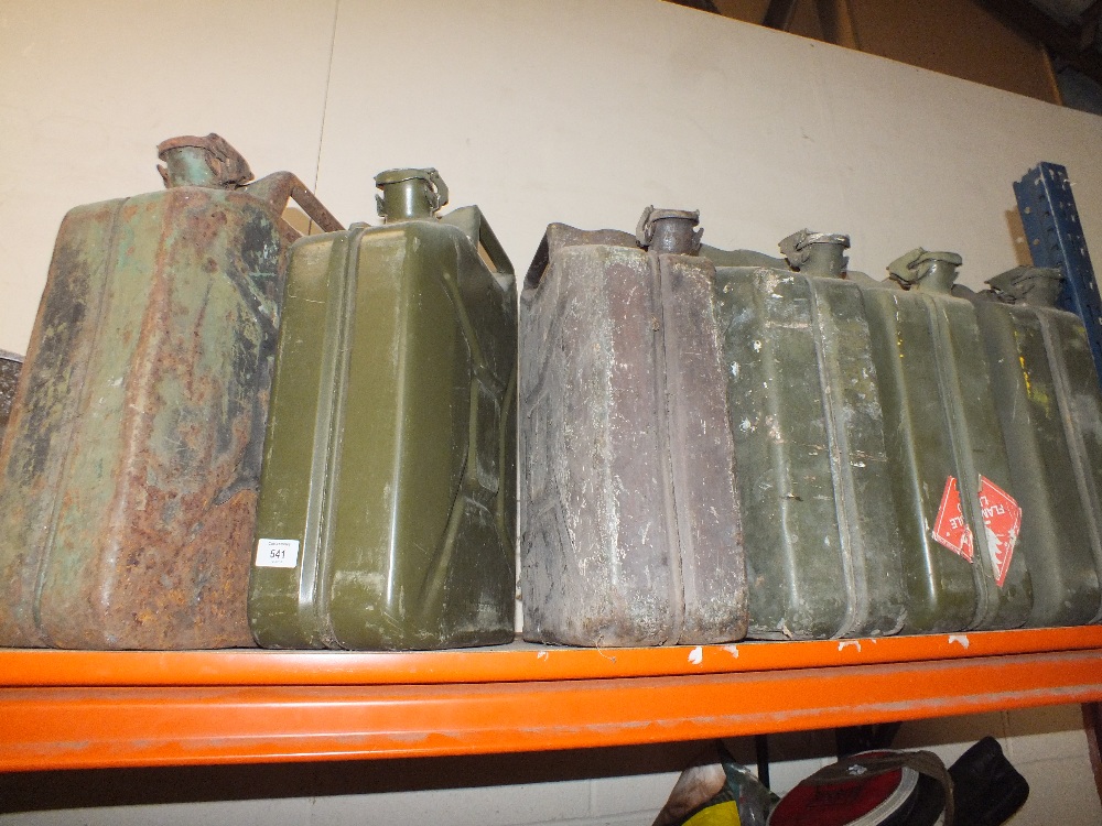 SIX GREEN JERRY CANS
