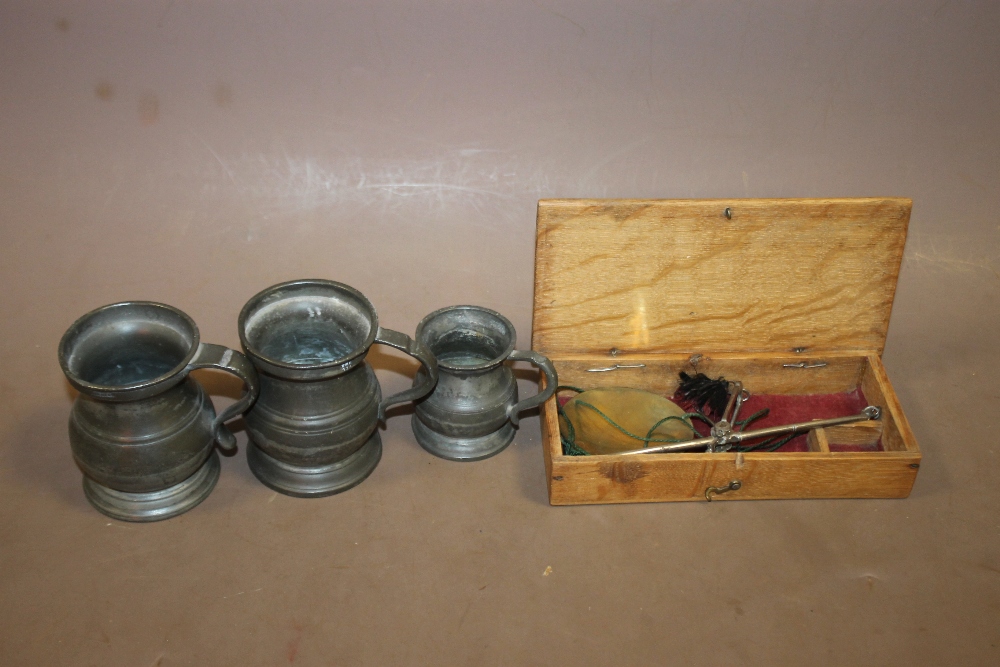A SET OF ANTIQUE SCALES TOGETHER WITH THREE VINTAGE PEWTER MEASURES