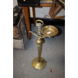 A BRASS CANDLE STAND