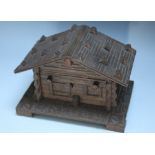 A CARVED BLACK FOREST NOVELTY LIDDED BOX, in the form of a Alpine chalet, engraved to one side '