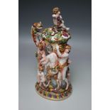 A LARGE 19TH CENTURY NAPLES / CAPODIMONTE LIDDED JUG, decorated with a Bacchanalia scene, with