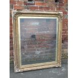 A LARGE ANTIQUE GILTWOOD AND GLAZED PICTURE FRAME, moulded detail throughout, rebate 98 x 80 cm A/F