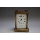 A BRASS CASED 'MAPPIN & WEBB' CARRIAGE CLOCK, enamel face with Roman numerals, Mappin & Webb Ltd.,