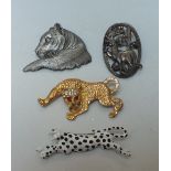 A VINTAGE PEWTER LIONS HEAD BROOCH BY 'J.J.', 6 x 5 cm, together with a 'Red Deer' brooch by