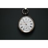 A J G GRAVES CONTINENTAL SILVER OPEN FACED MANUAL WIND POCKET WATCH, having white enamel dial, Roman