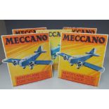 A COLLECTION OF FIVE VINTAGE MECCANO ADVERTISING SIGNS, with vintage aeroplane image to each,