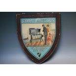 A 'VALOR - PERFECTION' OIL COOKING STOVES ADVERTISING PLAQUE, in shield shaped oak frame, glazed,