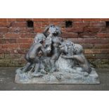 A LARGE BRONZED FIGURE GROUP DEPICTING A RECUMBANT DOG WITH THREE CHERUBS HOLDING VINES AND