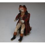 A 19TH CENTURY STYLE COLD PAINTED BRONZED FIGURE OF A SEATED FOX WITH KNIFE AND FORK, H 6.5 cm