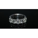 A 2.6 CARATS FIVE STONE DIAMOND RING, set with five brilliant cut diamonds in white gold stamped