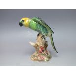 A BESWICK FIGURE OF A PARROT, model number 930, H 15 cm