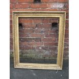 A 19TH CENTURY GILTWOOD CARVED PICTURE FRAME, moulded detail, rebate 75 x 62 cm