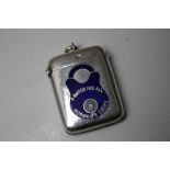 A RARE HALLMARKED SILVER AND ENAMEL ADVERTISING VESTA CASE FOR WORMALD'S LOCKS BY MAPPIN & WEBB -